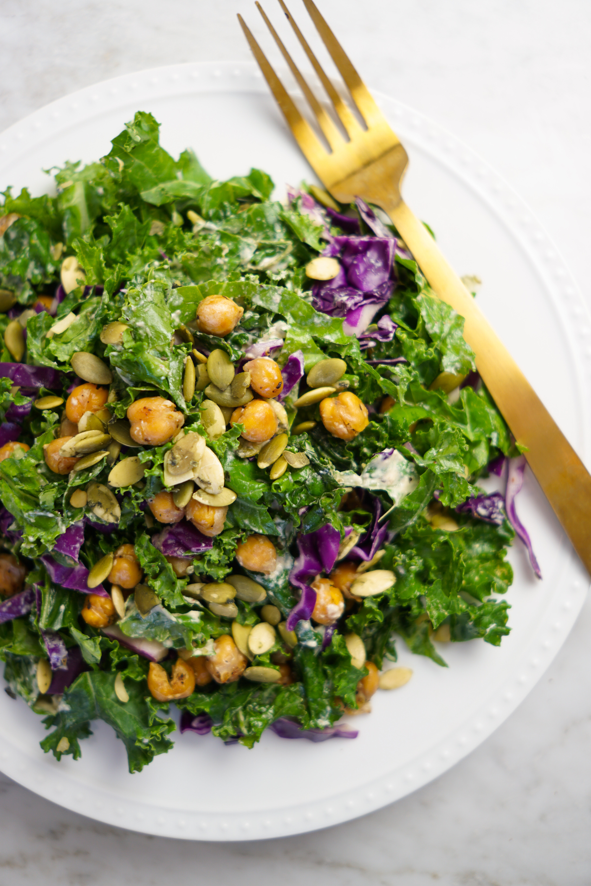 red cabbage and kale caesar salad