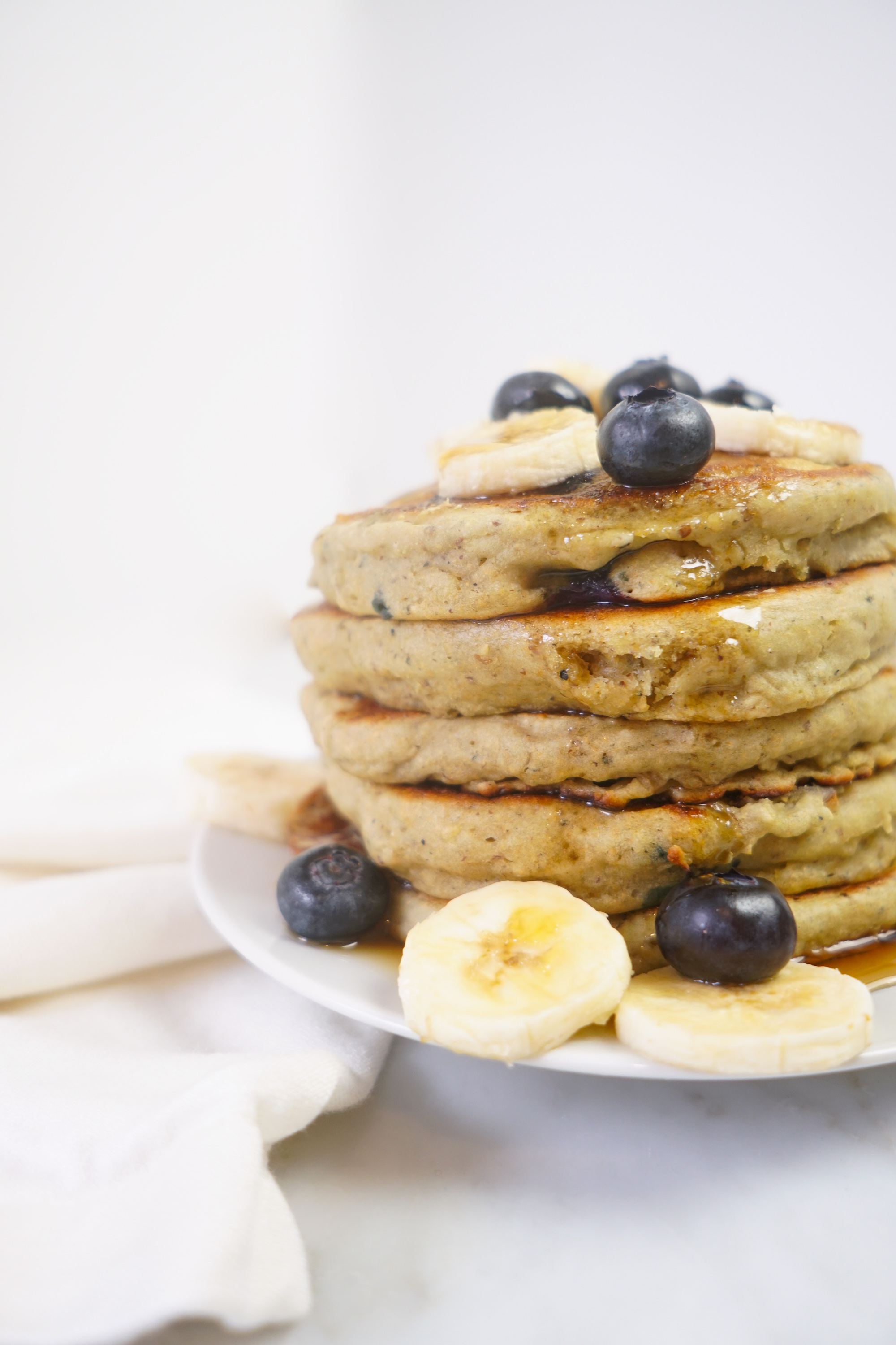 Vegan Yogurt Pancakes made whole grains + blueberry vegan yogurt!